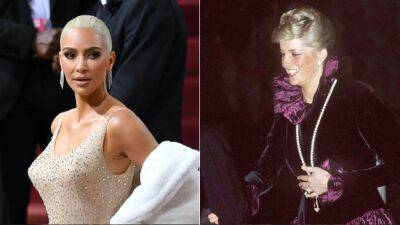 Kim Kardashian Bought a Cross Pendant Made Famous by Princess Diana—See Pics - www.glamour.com - London - Taylor
