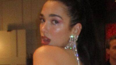 Dua Lipa Embraced the Exposed Thong Dress Trend on New Year's Eve—See Pics - www.glamour.com