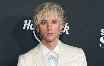 Watch Machine Gun Kelly confront stage crasher at panel event - www.nme.com