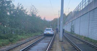 Metrolink services suspended after car driven onto tracks - www.manchestereveningnews.co.uk - Manchester - city Rochdale