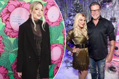 Tori Spelling reacts as ex Dean McDermott cozies up to Lily Calo - nypost.com - Los Angeles - Los Angeles