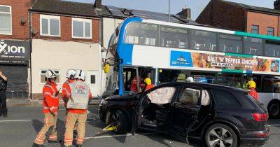 Injured woman rescued with six in hospital after double decker bus and Audi crash - www.manchestereveningnews.co.uk - Manchester