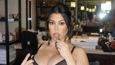 Kourtney Kardashian Just Hid Her Most Daring Maternity Lingerie Photo in Plain Sight - www.glamour.com - Italy