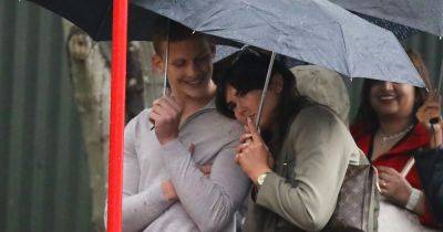 Freddie Brazier snuggles up to mystery brunette in rain as they support Bobby at Strictly Come Dancing - www.ok.co.uk