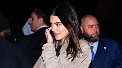 Kendall Jenner Wears Baggy Pants and Normcore Footwear to Support Bad Bunny - www.glamour.com - Italy