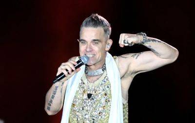 Robbie Williams Believes “Being In A Boy Band Causes Mental Illness” - deadline.com - Britain
