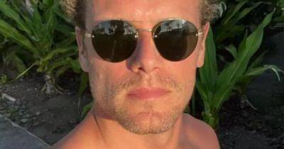 Sam Heughan teases fans with 'taps aff' snaps as he enjoys Caribbean holiday - www.dailyrecord.co.uk - Scotland