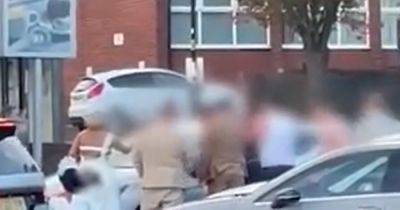 Moment bride wades into fight after brawl breaks out in hotel car park - www.dailyrecord.co.uk - Scotland - Beyond