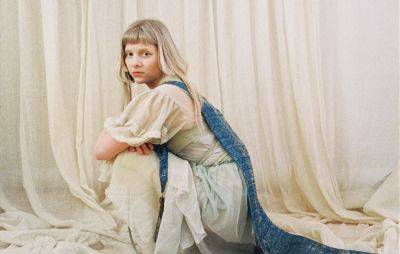 AURORA announces first book, ‘The Gods We Can Touch’ - www.nme.com - Norway - Beyond