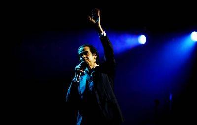 Watch Nick Cave debut new song ‘To Be Found’ in Chicago - www.nme.com - Australia - Chicago - county Cleveland