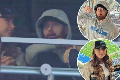 Eminem makes rare appearance at Detroit Lions game with daughter Hailie Jade - nypost.com - Detroit - state Iowa - city Lions