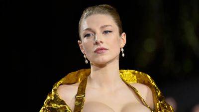 Hunter Schafer Embraces the Exposed Bra Trend With a Red Carpet Reference to The Hunger Games - www.glamour.com - Britain - Berlin