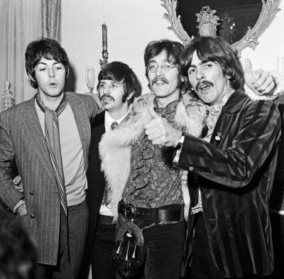 Beatles Break Three New Records To Make Music History With “Last Ever Song” - deadline.com - Britain - New York