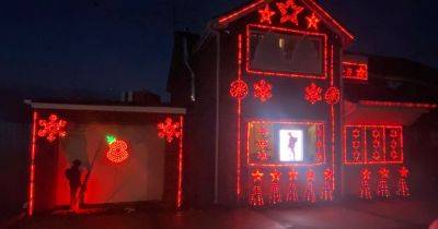 Couple decorate home for Remembrance Day as traffic stops to see £8,000 display - www.dailyrecord.co.uk - Scotland - Beyond