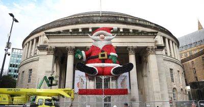 Santa Claus lands in Manchester as 20m Father Christmas wows shoppers - www.manchestereveningnews.co.uk - county Hall - city Santa Claus - Manchester - Santa