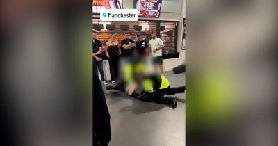 Moment man tasered as police officer kicked amid brawl at Manchester AO Arena on Liam Smith v Chris Eubank Jr fight night - www.manchestereveningnews.co.uk - Manchester