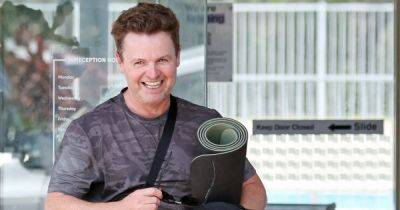 Dec Donnelly beams after yoga session in Australia wearing viral Uniqlo bag ahead of I'm A Celeb - www.ok.co.uk - Australia