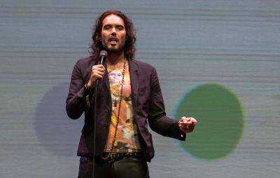 Russell Brand reportedly questioned by police over alleged assault allegations - www.nme.com - Scotland
