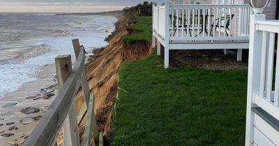 Holiday park evacuated after clifftop just inches away from caravans collapses - www.dailyrecord.co.uk