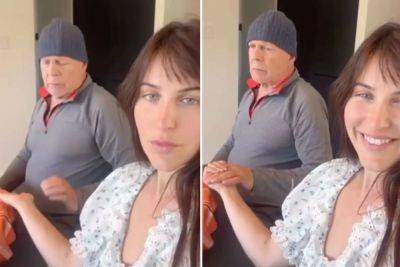 Frail-looking Bruce Willis, 68, clutches daughter’s hand amid dementia battle - nypost.com