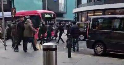 Mass brawl breaks out in Glasgow as dozens clash with chairs thrown outside pub - www.dailyrecord.co.uk - Scotland - Beyond