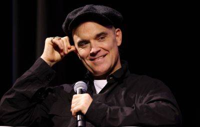 Robbie Williams says releasing single ‘Rudebox’ is “biggest regret” of his career - www.nme.com - Adidas