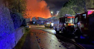 Huge inferno breaks outs at cheese business as 50 firefighters fight flames - www.manchestereveningnews.co.uk - Manchester - county Lane