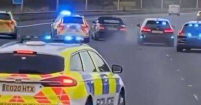 Remarkable footage shows the moment police surround BMW driver on M6 after terrifying chase - www.manchestereveningnews.co.uk - Manchester