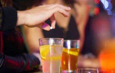 UK drink-spiking laws to be “modernised” as campaigners call for specific criminal offence - www.nme.com - Britain