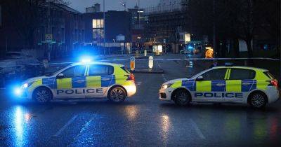 Police cordon remains in place on scene of 'targeted' drive-by shooting - www.manchestereveningnews.co.uk - Manchester