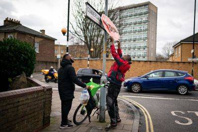 Two Men Arrested After Banksy Artwork Stolen From London Road Junction - deadline.com - London