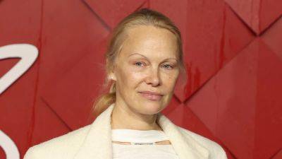 Pamela Anderson Went Makeup-Free at Another Fashion Event and She's Still Glowing - www.glamour.com - county Hall