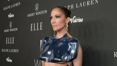 Jennifer Lopez Gives Us ‘I, Robot’ With Under Boob on the Red Carpet - www.glamour.com - Hollywood - Puerto Rico