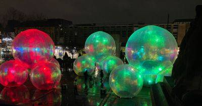 Giant inflatable bubbles take over Greater Manchester town as incredible light festival continues - www.manchestereveningnews.co.uk - Manchester - county Person