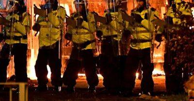 Three arrested after protest turns violent outside Merseyside hotel - www.dailyrecord.co.uk