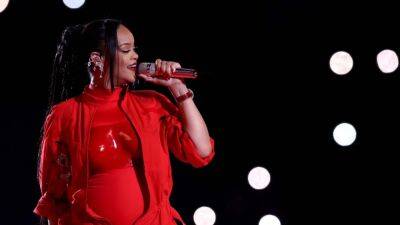 Rihanna Says She Had 'No Clue' She Was Pregnant While Doing Magazine Photo Shoot With Son - www.etonline.com - Britain