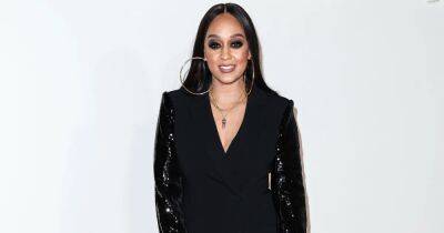 Tia Mowry Rocked a Leopard Print Bodysuit and Thigh-High Boots — But Her Son Cree Disapproved - www.usmagazine.com