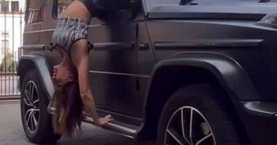 Watch as Myleene Klass somersaults through car window in mind-blowing video - www.ok.co.uk