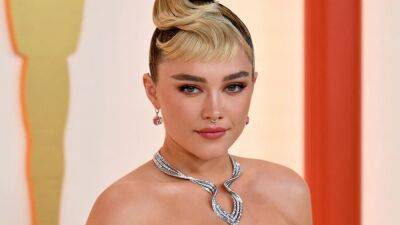 Florence Pugh Paired Her Dramatic Oscars Gown With Peekaboo Micro Shorts - www.glamour.com - county Bell
