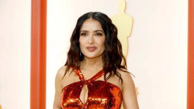 Salma Hayek Is the Flame Emoji Come to Life at the 2023 Oscars - www.glamour.com