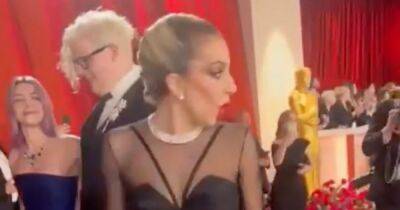 Lady Gaga leaps into action and halts interview as Oscars photographer takes a tumble - www.ok.co.uk - Los Angeles - Hollywood