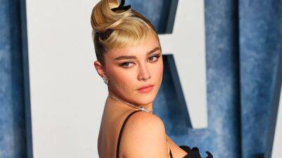 Florence Pugh Wore an Enormous Pink Coat Over a Bra Top to the Vanity Fair Oscar Party - www.glamour.com