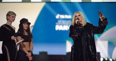 Avril Lavigne tells topless environmentalist to ‘get the f*** off’ stage as she interrupts awards ceremony - www.manchestereveningnews.co.uk - Canada - county Ontario