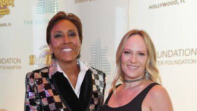 Robin Roberts Gives Update on Partner Amber Laign's Breast Cancer Treatment and Wedding Planning (Exclusive) - www.etonline.com