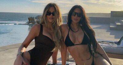 Kim and Khloe Kardashian Twin in Sexy Black Swimsuits as They ‘Take Cabo’: Pics - www.usmagazine.com - Los Angeles - Mexico - Poland