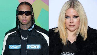 Avril Lavigne and Tyga Seem to Confirm Dating Rumors By Publicly Making Out - www.glamour.com - Paris - Los Angeles