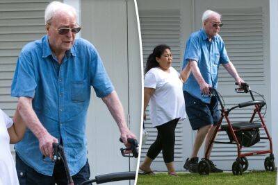 Michael Caine, 90, relaxes at the beach after spinal surgery - nypost.com - Britain - London - Hollywood - Barbados