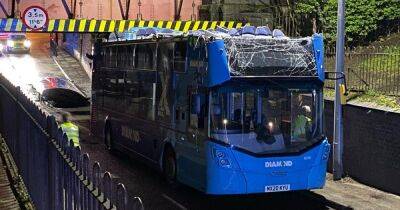 BREAKING: Double-decker bus roof RIPPED off after hitting bridge - www.manchestereveningnews.co.uk - Manchester - county Lane - county Barton