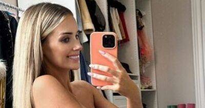Pregnant Laura Anderson strips completely naked to show off growing baby bump - www.ok.co.uk