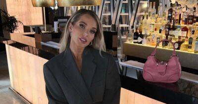 Helen Flanagan branded 'the hottest' by Carol Vorderman as legs cause massive distraction with 'boss' snap - www.manchestereveningnews.co.uk - Manchester - county Webster - South Africa